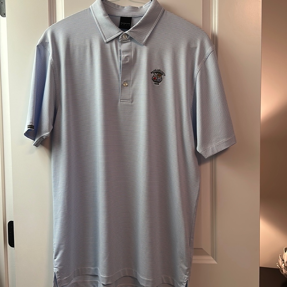 Baby blue and white thin stripe golf shirt with Wannamoisett Country club logo